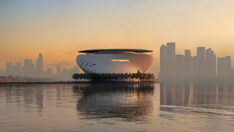 The design for the Dubai Museum of Art by Tadao Ando, a pale bowl rising from the water against the city skyline at dusk, a mid-April engagement in the season calendar of The Mansa Court