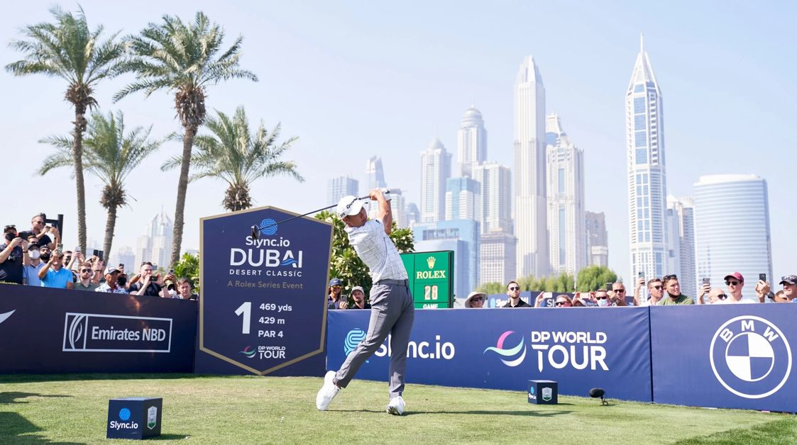Players on the first tee at the Dubai Desert Classic
