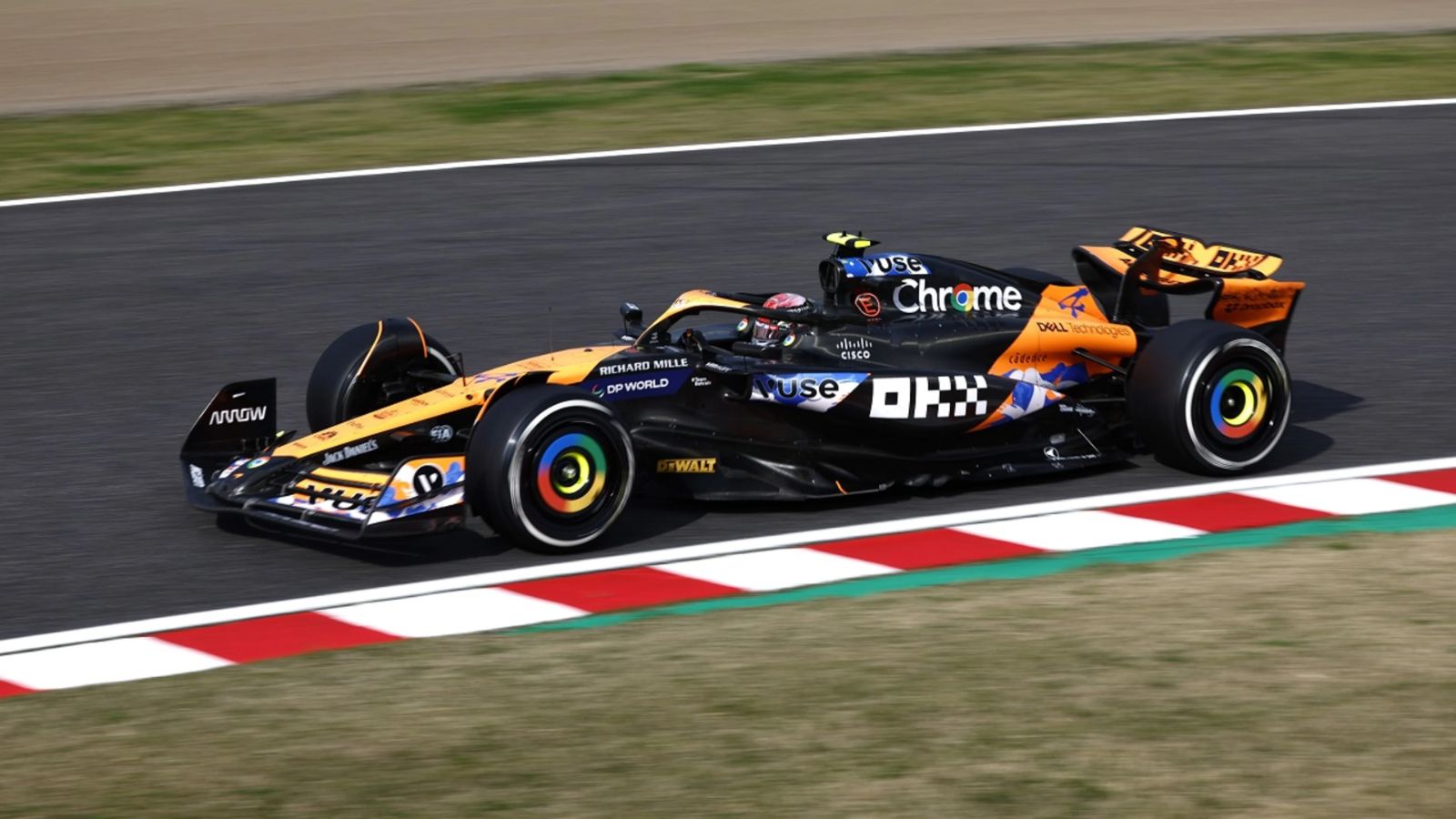 A Formula 1 car on the kerb through the Suzuka esses at the Japanese Grand Prix, the late-March round The Mansa Court keeps in Japan