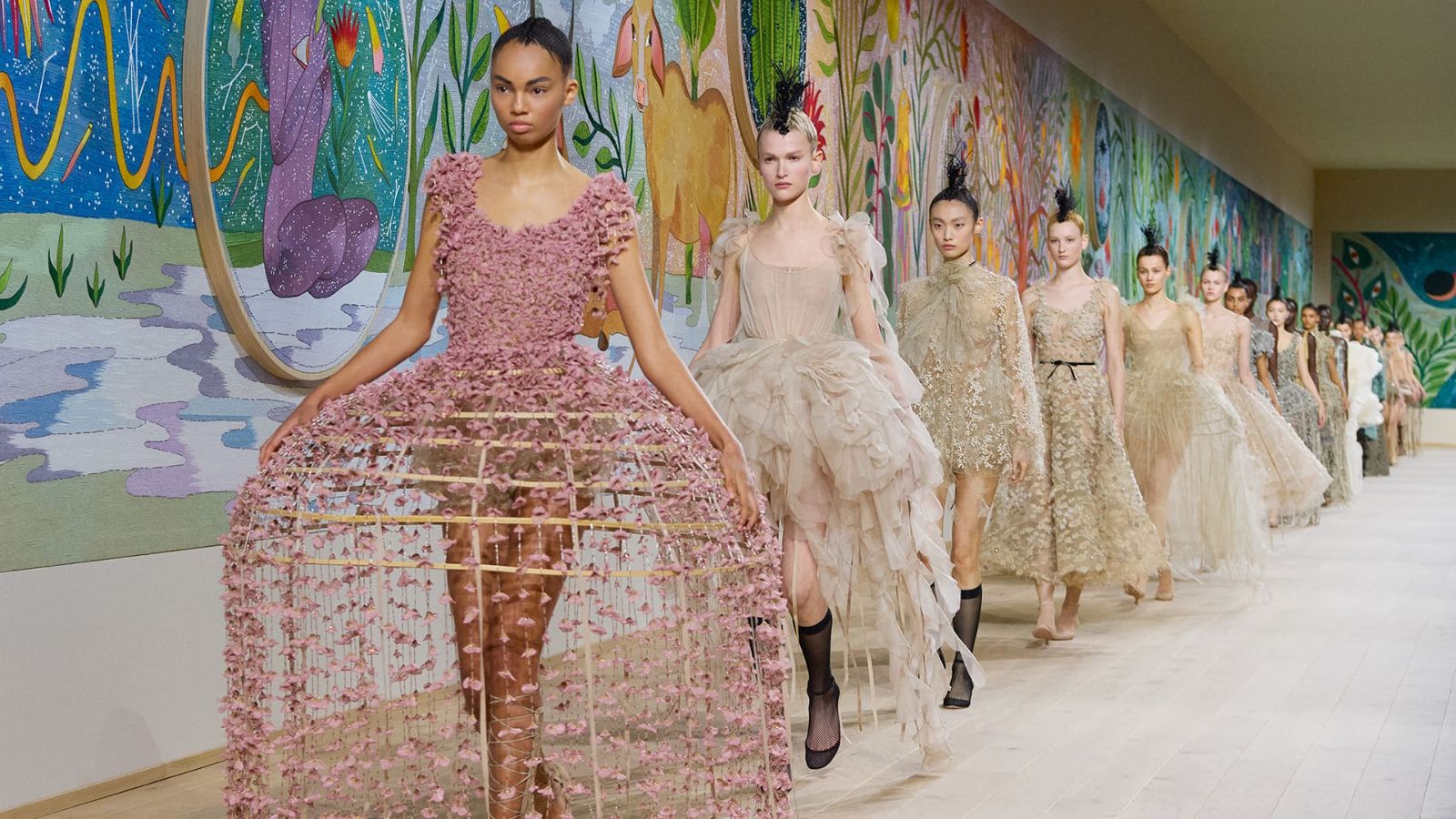 Models in procession for a couture finale during Haute Couture Week in Paris