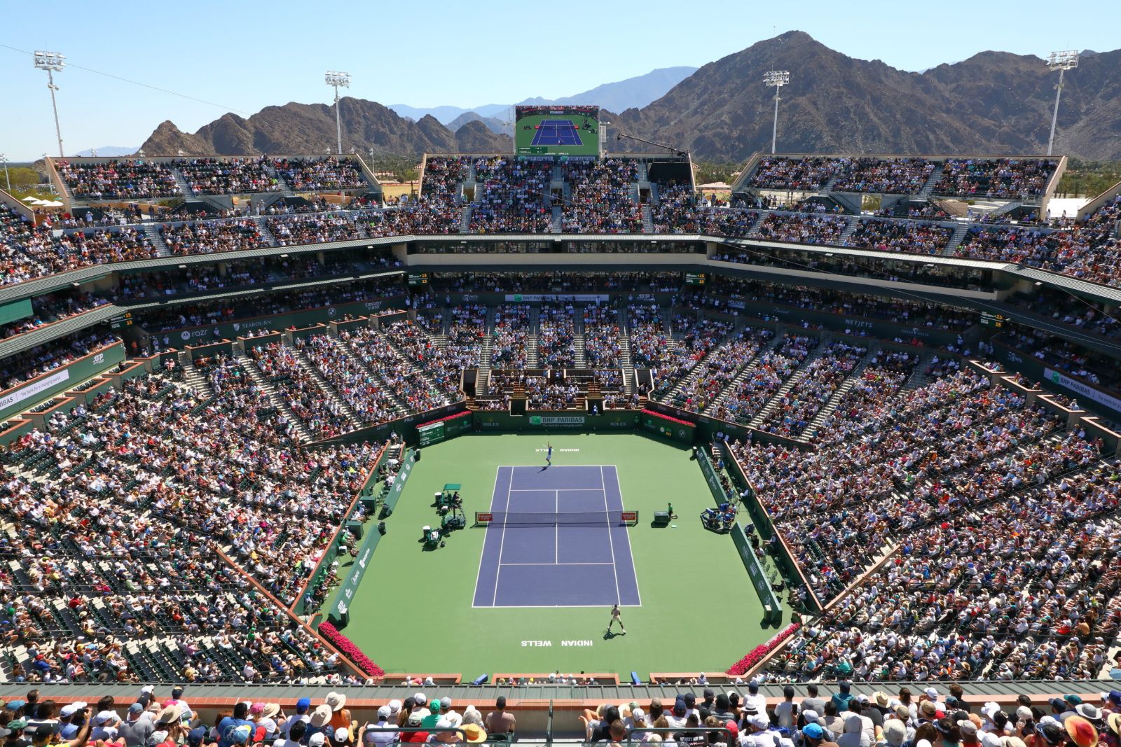 Stadium 1 at the Indian Wells Tennis Garden filled to the rafters beneath the Santa Rosa mountains, the BNP Paribas Open attended by members of The Mansa Court