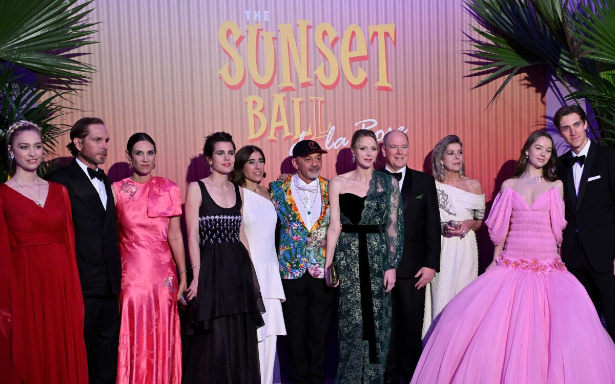The princely family and the ball’s designer on stage before the themed backdrop at Le Bal de la Rose, Monte Carlo, a March engagement in The Mansa Court season calendar