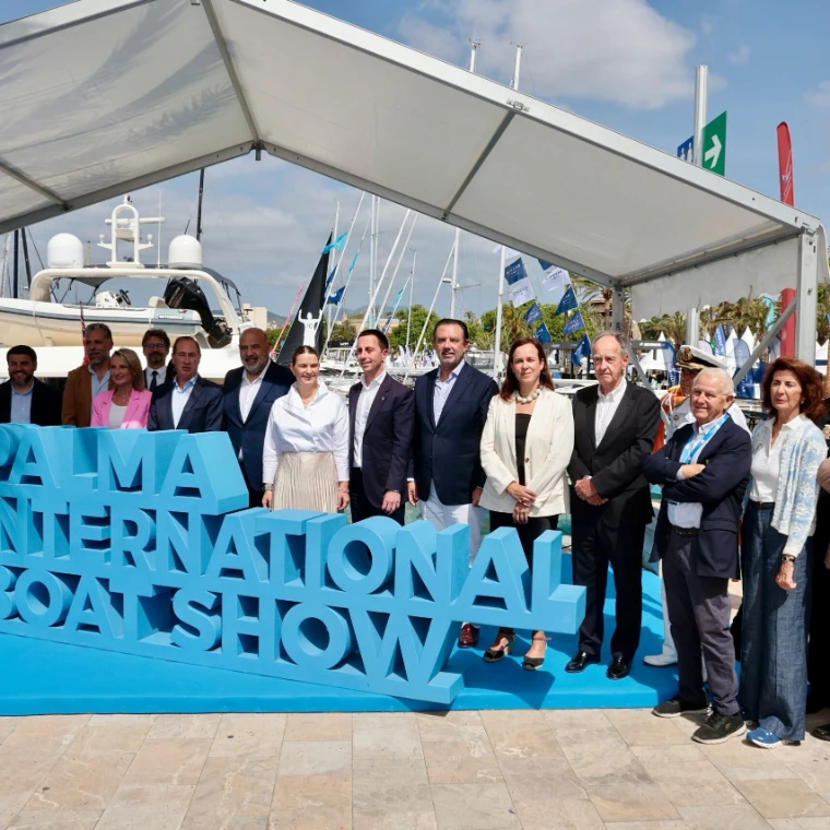 Officials and guests gathered behind the show sign at the opening at the Palma International Boat Show, a late-April engagement in the season calendar of The Mansa Court
