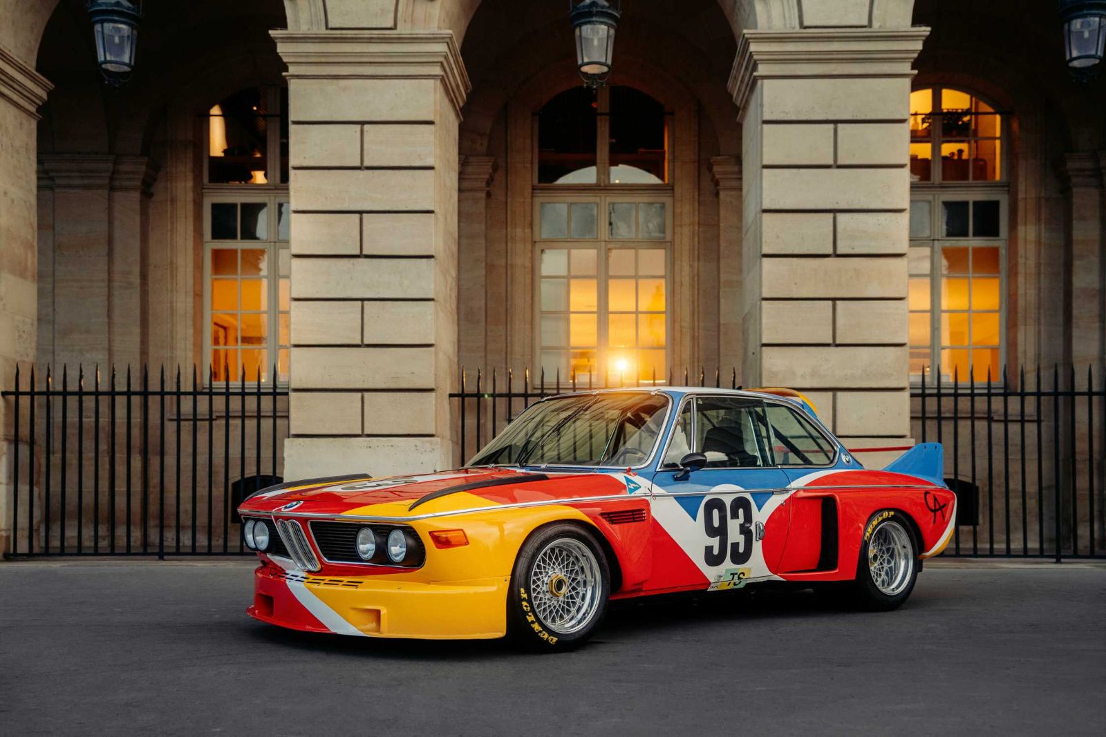The Alexander Calder BMW 3.0 CSL art car under a Paris arcade during Rétromobile week