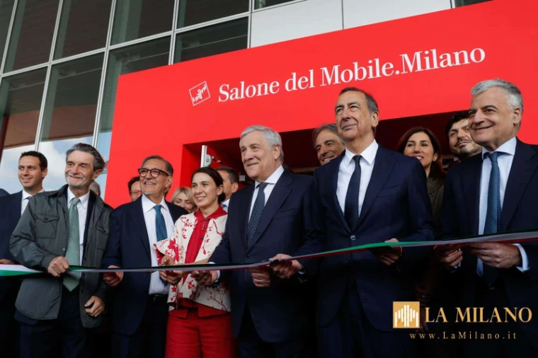 Antonio Tajani among the officials cutting the tricolour ribbon beneath the Salone del Mobile.Milano sign to open the 2026 fair, an April engagement in the season calendar of The Mansa Court