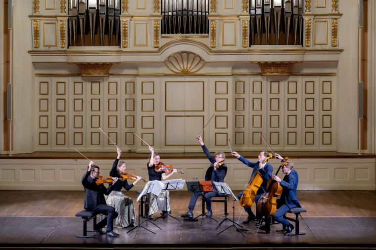 Members of the Berliner Philharmoniker play chamber music before the Mozarteum organ. Salzburg Easter Festival, The Großer Saal, Mozarteum, Salzburg (28 March 2026), in the season calendar of The Mansa Court