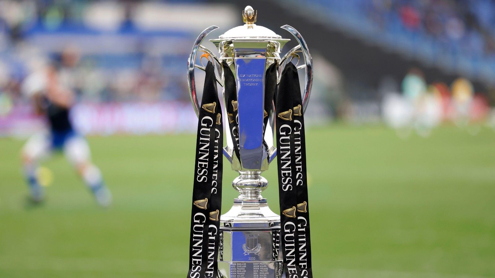 The silver Six Nations Championship trophy with its ribbons on a plinth at the side of the pitch before kick-off