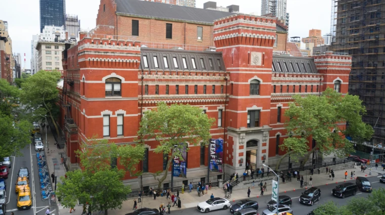 The Park Avenue Armory seen from above on an opening day, visitors queuing along the pavement. TEFAF New York at the Park Avenue Armory, in the season calendar of The Mansa Court