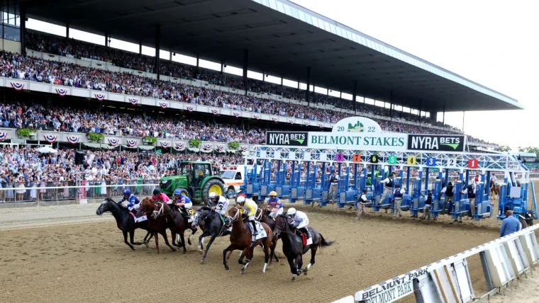 The field breaks from the gate before the packed grandstand at Belmont Park (2022). The Belmont Stakes, the final leg of the Triple Crown, in the season calendar of The Mansa Court