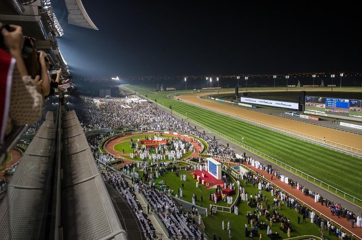 The parade ring and the crowd beneath the Meydan grandstand on Dubai World Cup night, the closing meeting of the Dubai Carnival kept in The Mansa Court calendar