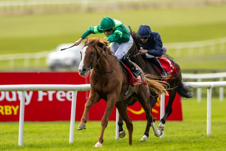 A chestnut colt in green silks driving clear of the field along the rail in the final furlong of the Irish Derby at the Curragh, a late-June engagement in the season calendar of The Mansa Court