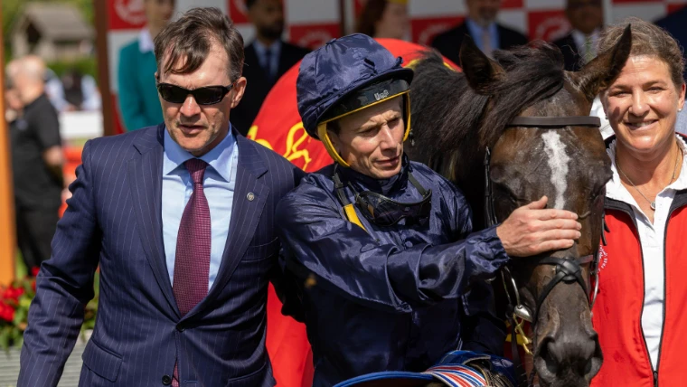 The winning colt led into the winners enclosure beneath his rug, his connections beside him, after the Irish Derby at the Curragh, an engagement in the season calendar of The Mansa Court