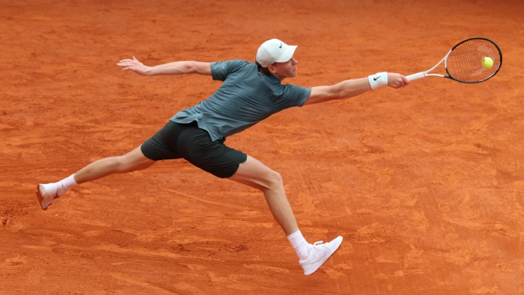 A player at full stretch for the ball on the red clay of the Rolex Monte-Carlo Masters, an April engagement in the season calendar of The Mansa Court