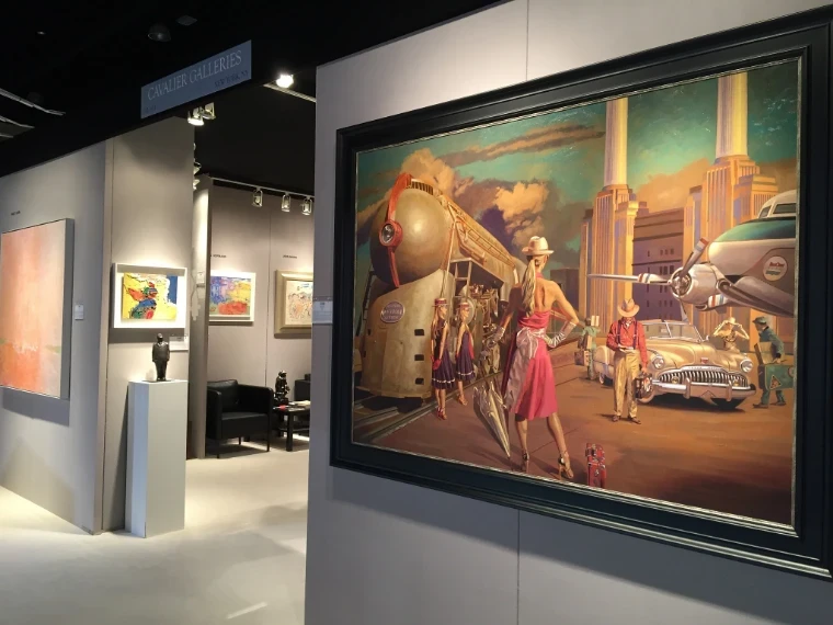 Paintings and bronze sculpture on the Cavalier Galleries stand at a Palm Beach art and antiques fair, a large canvas of a streamlined locomotive in the foreground, an engagement in the season calendar of The Mansa Court