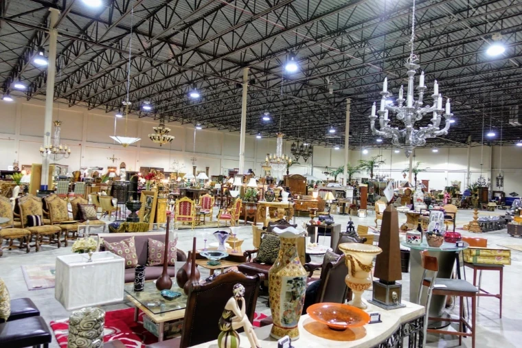 A long showroom floor of antique furniture, porcelain vases and hanging chandeliers, the trade behind The Palm Beach Show, an engagement in the season calendar of The Mansa Court