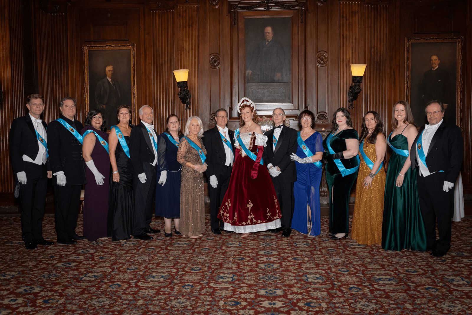 The committee of the Piarist Debutante Ball in sashes before the evening begins