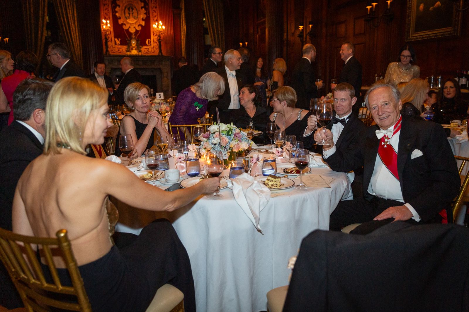 Dinner by candlelight in the panelled hall of the University Club at the Piarist Debutante Ball