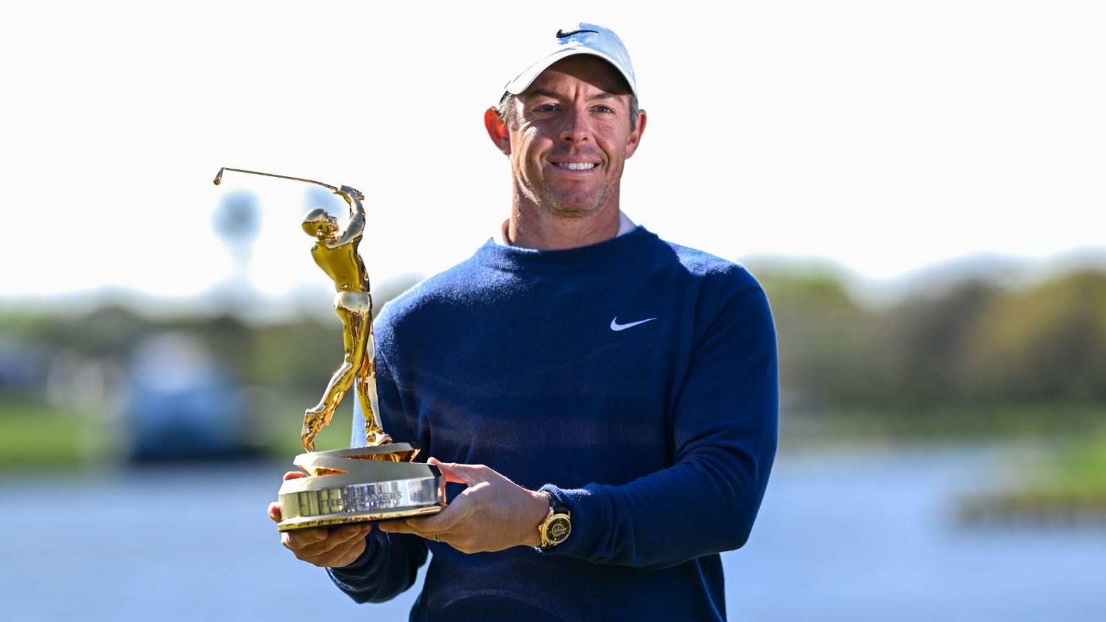 The champion holding the gold trophy after the final round of The Players Championship, Ponte Vedra Beach, Florida, kept in The Mansa Court calendar