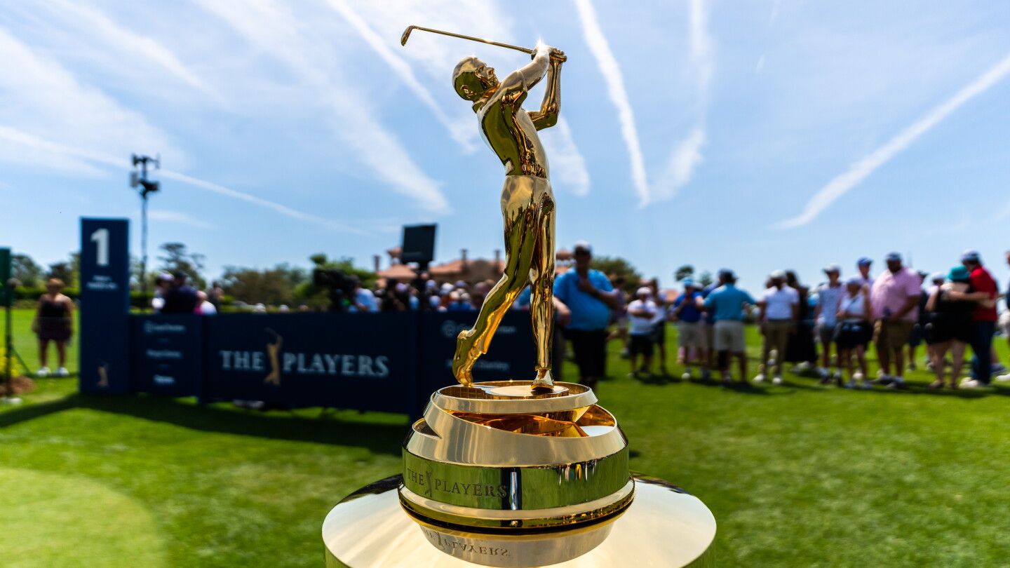 The gold trophy on its plinth beside the first tee at The Players Championship, TPC Sawgrass, the March engagement The Mansa Court keeps in Ponte Vedra Beach