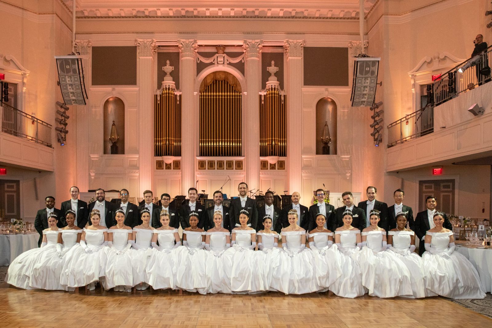 Group portrait of the debutantes and escorts of The Quadrille Ball, New York