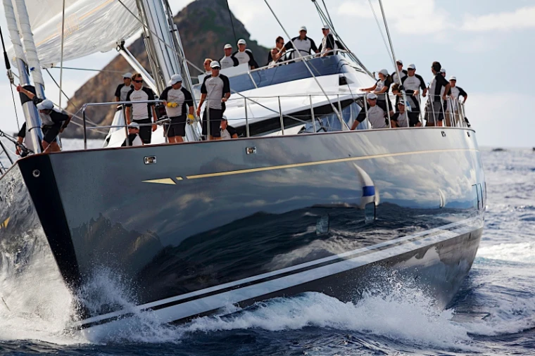 Kokomo’s crew lines the rail as she heels on a beat. The St. Barths Bucket, off St. Barthélemy, in the season calendar of The Mansa Court