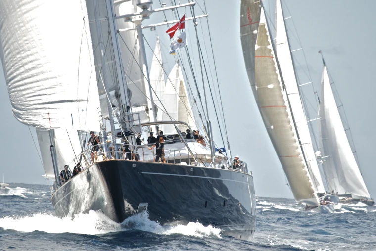 Parsifal III drives through the swell, her crew on deck (2011). The St. Barths Bucket, off St. Barthélemy, in the season calendar of The Mansa Court