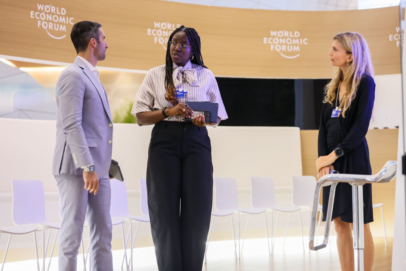 Participants in conversation between sessions at Davos